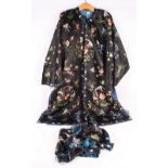 A Chinese silk robe embroidered birds, flowers and butterflies on a black ground with blue lining