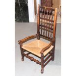 An 18th Century spindle back rush seat carver chair