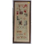 A framed sampler worked various designs including Red Ensign and inscribed "Braved 1000 years",