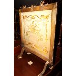 A 19th Century gilt wood framed firescreen in reeded frame, inset embroidered silk panel of a vase