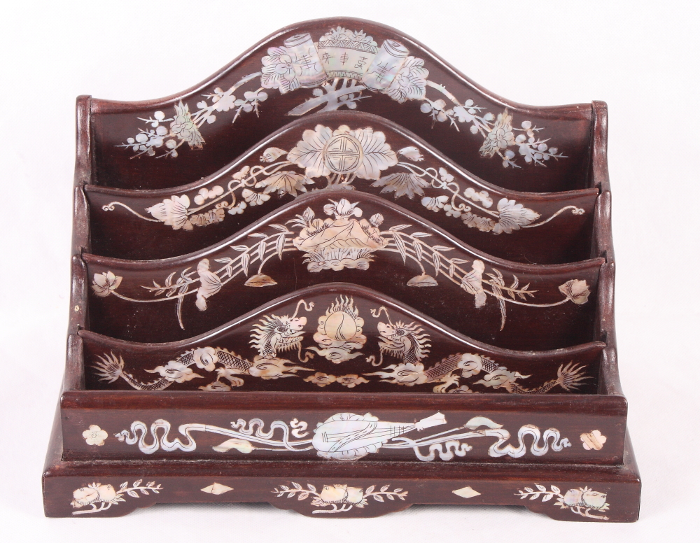 An early 20th Century Chinese hardwood letter rack with mother-of-pearl inlay