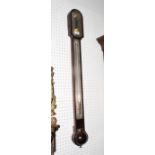 A 19th Century stick barometer with silvered register plate and thermometer