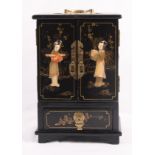 An oriental ebonised table cabinet decorated in gilt and hardstone, fitted five drawers, 8" wide