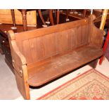 A Victorian pine pew seat, 55" long