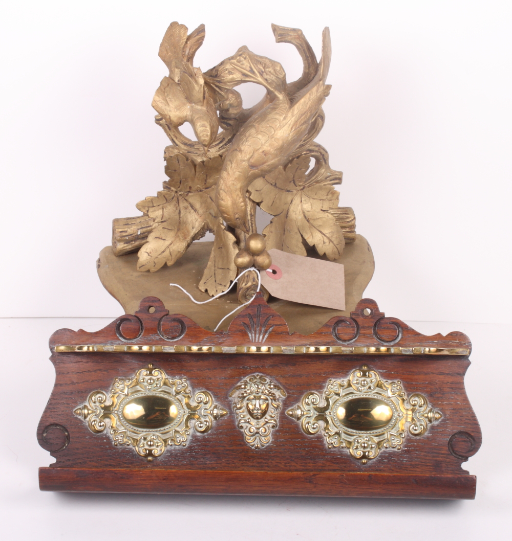 A Victorian brass mounted oak pipe rack, 13" wide, and a giltwood wall bracket carved birds