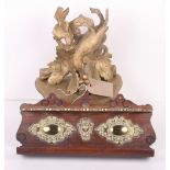 A Victorian brass mounted oak pipe rack, 13" wide, and a giltwood wall bracket carved birds