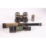 A pair of leather cased brass binoculars, a monocular, a four draw black painted brass telescope and