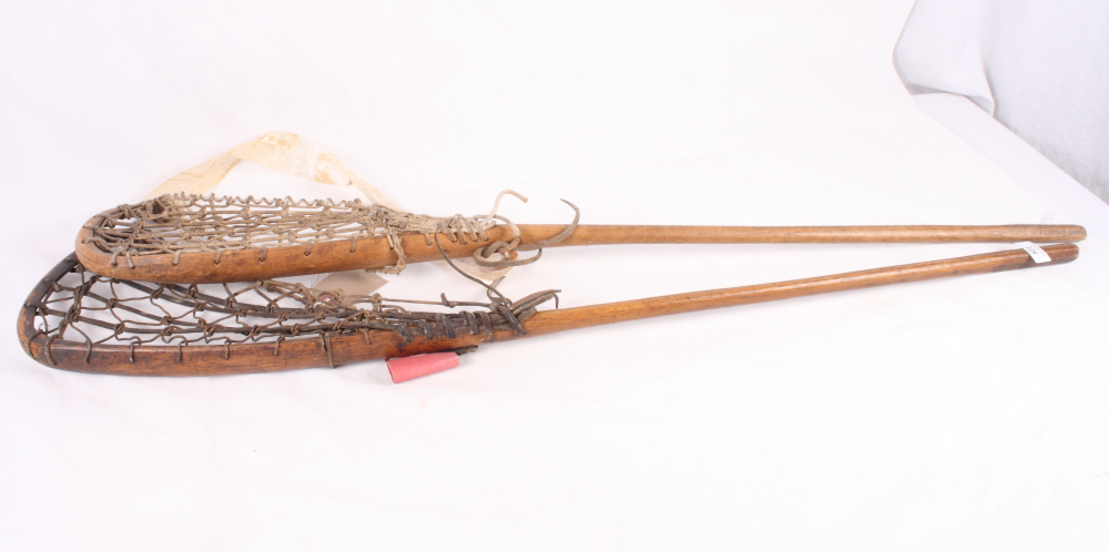 Two mid 20th Century wooden lacrosse/hurling racquets