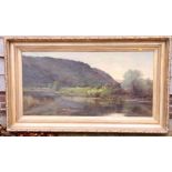 An early 20th Century oil on canvas, river landscape with sheep grazing on far bank, 24" x 48", in