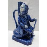 A Peggy Davies ceramics figural jug depicting James Macintyre in rare blue colourway, 23cm