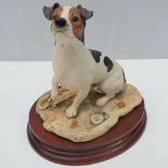 Border Fine Arts. Jack Russell tri colour terrier bitch, dated 1992 and standing 14cm high on wood