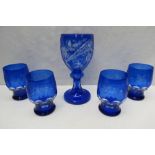 A Bohemian blue cut glass chalice together with a similar set of four glasses.
