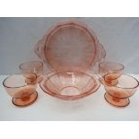 Four vintage rose glass dessert bowls and a rose glass pressed tray and matching bowl.