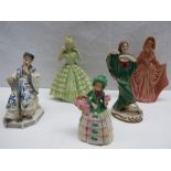 Five assorted handpainted ceramic figurines including early 20thC Japanese export 'seated
