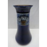 A Doulton blue glazed vase decorated with roses, 25cm.