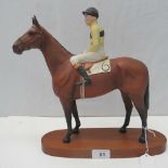 A large matt Beswick Connoisseur racehorse - Arkle with Pat Taaffe up. 29cm long