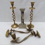 A pair of open twist brass candlesticks,