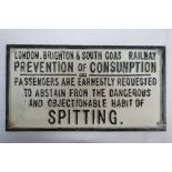 A cast metal railway sign "No Spitting",