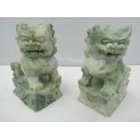 A pair of 19thC hand carved green soapst
