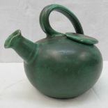 An early 20th century green glazed tea p