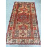 A patterned Hamadan style rug measuring