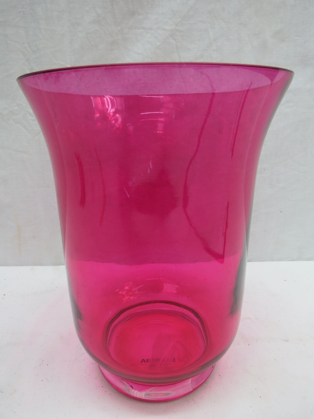 A large Cranberry glass vase, 18cm