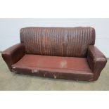 A 20's/30's leather settee.  For Restora