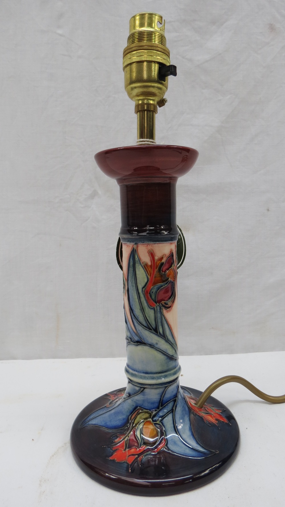A Moorcroft table lamp with tulip design