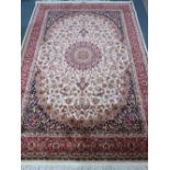 A beige ground Keshan carpet 230cm x 160