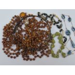 Costume jewellery including a green ston