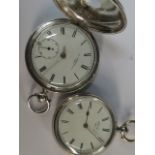 Two silver cased pocket watches; a half