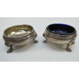 A pair of round silver salts each with t