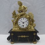 A mantle clock in the style of the 19thC