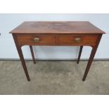 A twin drawer oak side table raised over