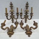 A pair of gilded gesso two lamp wall sco