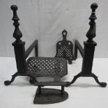 A pair of wrought iron fire dogs, togeth