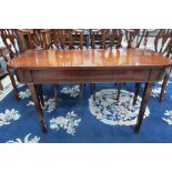 A late George III narrow mahogany hall t