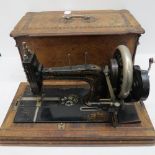 A 19thC Singer sewing machine with elabo