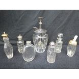 A silver topped cut glass pepper pot (be