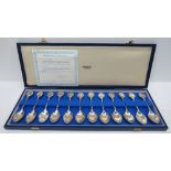 A cased set of 12 'Zodiac' silver spoons