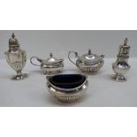 An HM silver condiment set with gadroone