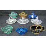 Seven pressed glass baskets by Sowerby o