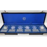 Six 999 fine silver proof medals by the