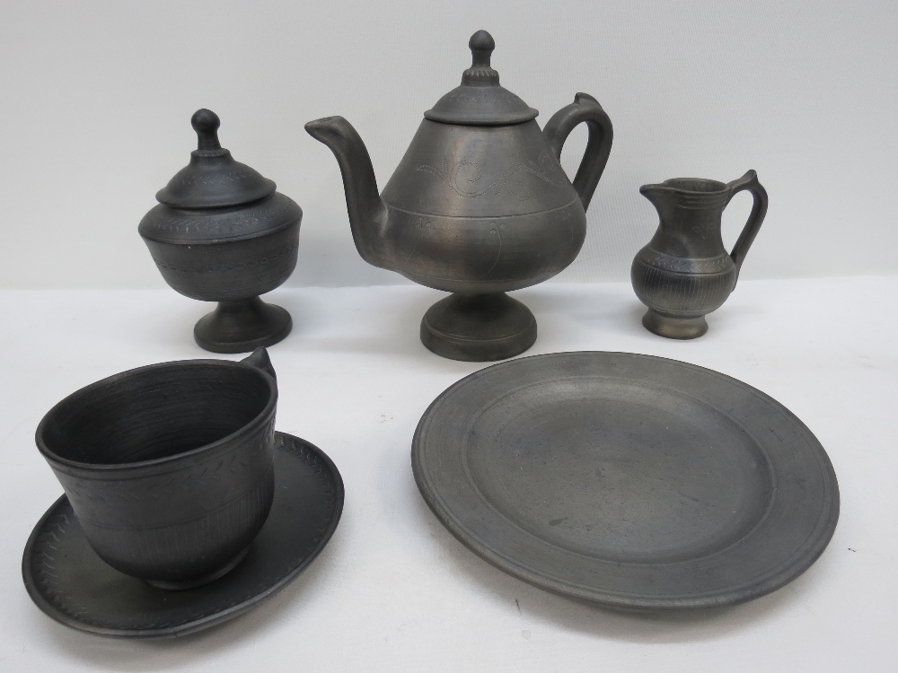 A black Basalt ware batchelors tea for o