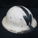 A British steel helmet painted as for an