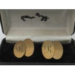 A pair of 9ct gold cufflinks each engrav