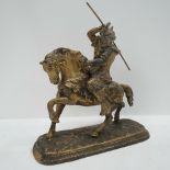 A painted spelter figure of a mounted Sa