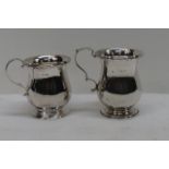 An HM silver Christening cup with scroll