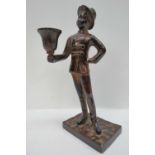 A bronze effect cast metal figural candl