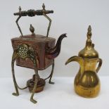 A copper and brass table kettle in Art N